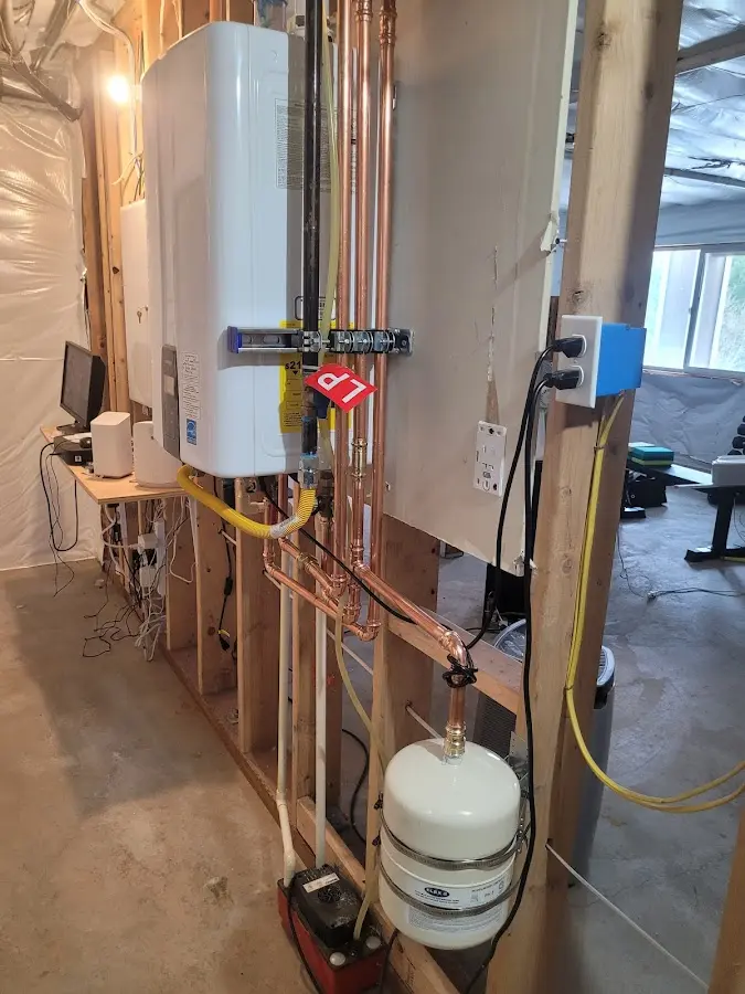 Licensed plumber repairing a kitchen sink in Oregon